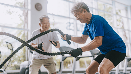fitness-man-does-rope-HIIT-workout-at-the-gym