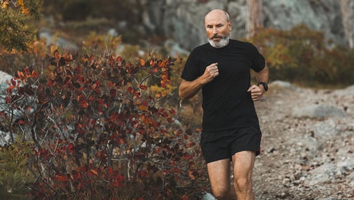 A man having a somatic experience while on an outdoor run