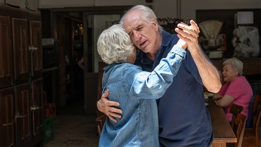 Two people in a flow state while slow dancing together