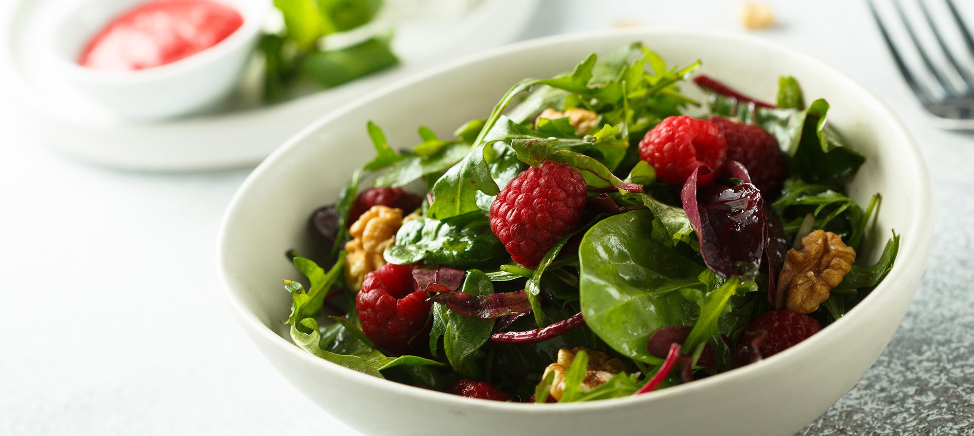 A Sweet, Crunchy, and Savory Spinach Salad With Raspberry Dressing